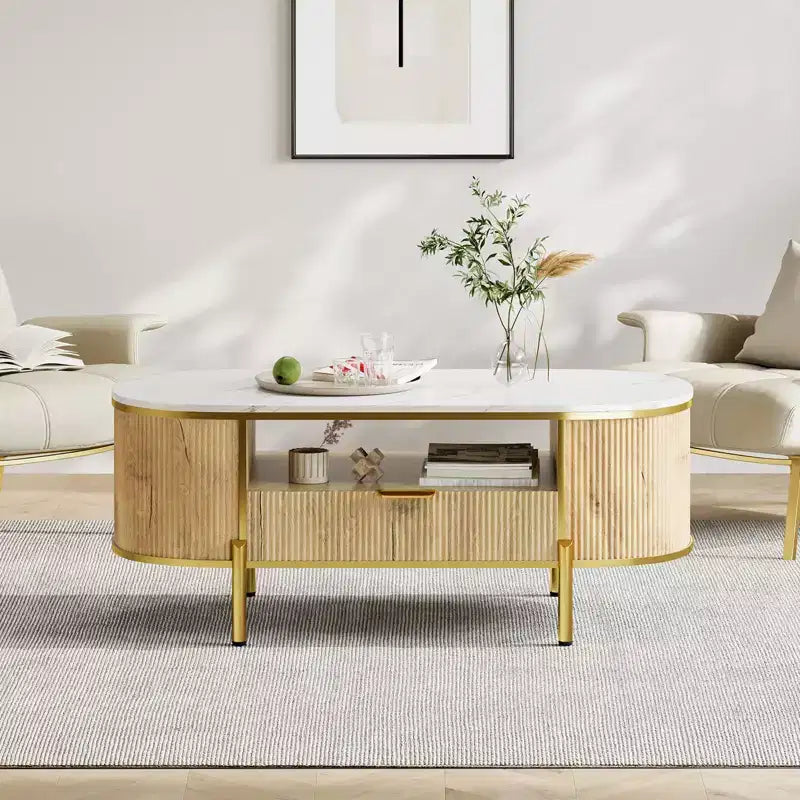 Table basse cannelée moderne, ovale 122 cm avec tiroir, plateau en faux marbre et accents métalliques dorés