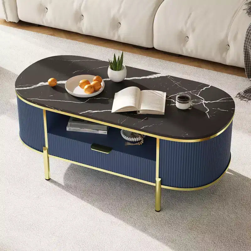 Table basse cannelée moderne, ovale 122 cm avec tiroir, plateau en faux marbre et accents métalliques dorés